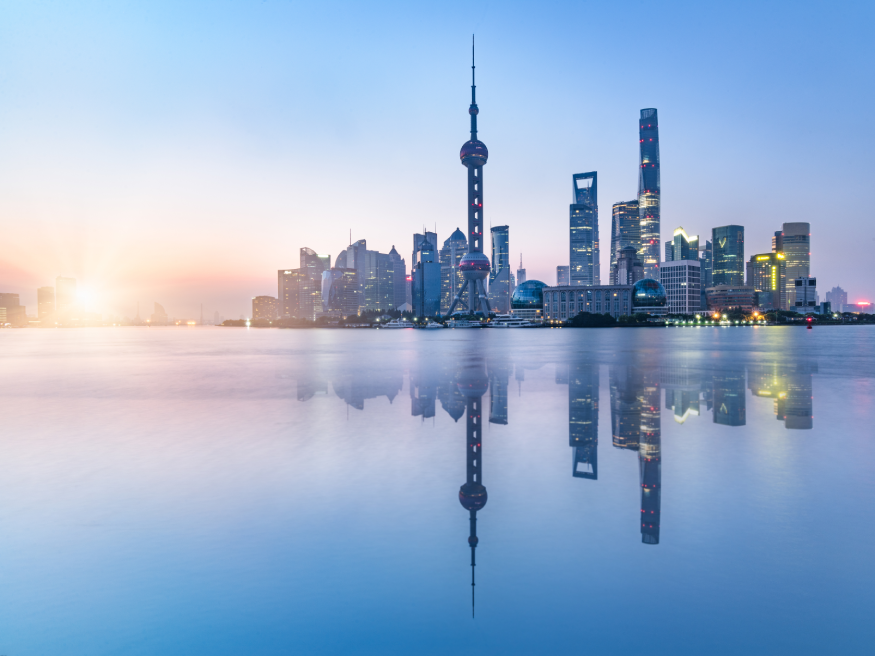 Image of the Shanghai, China city skyline in front of a sunrise